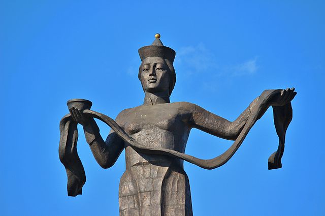 The Mother of Burtyatia statue, Siberia. A stone statue of a woman making a gesture of welcome By Аркадий Зарубин - Own work, CC BY-SA 3.0, https://commons.wikimedia.org/w/index.php?curid=22968703 