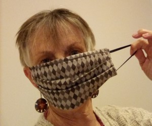 woman wearing a cloth mask with elastic ear loops